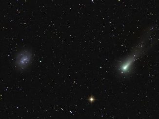 Comet C/2021 A1 Leonard passing NGC 4395