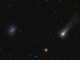 Comet C/2021 A1 Leonard passing NGC 4395